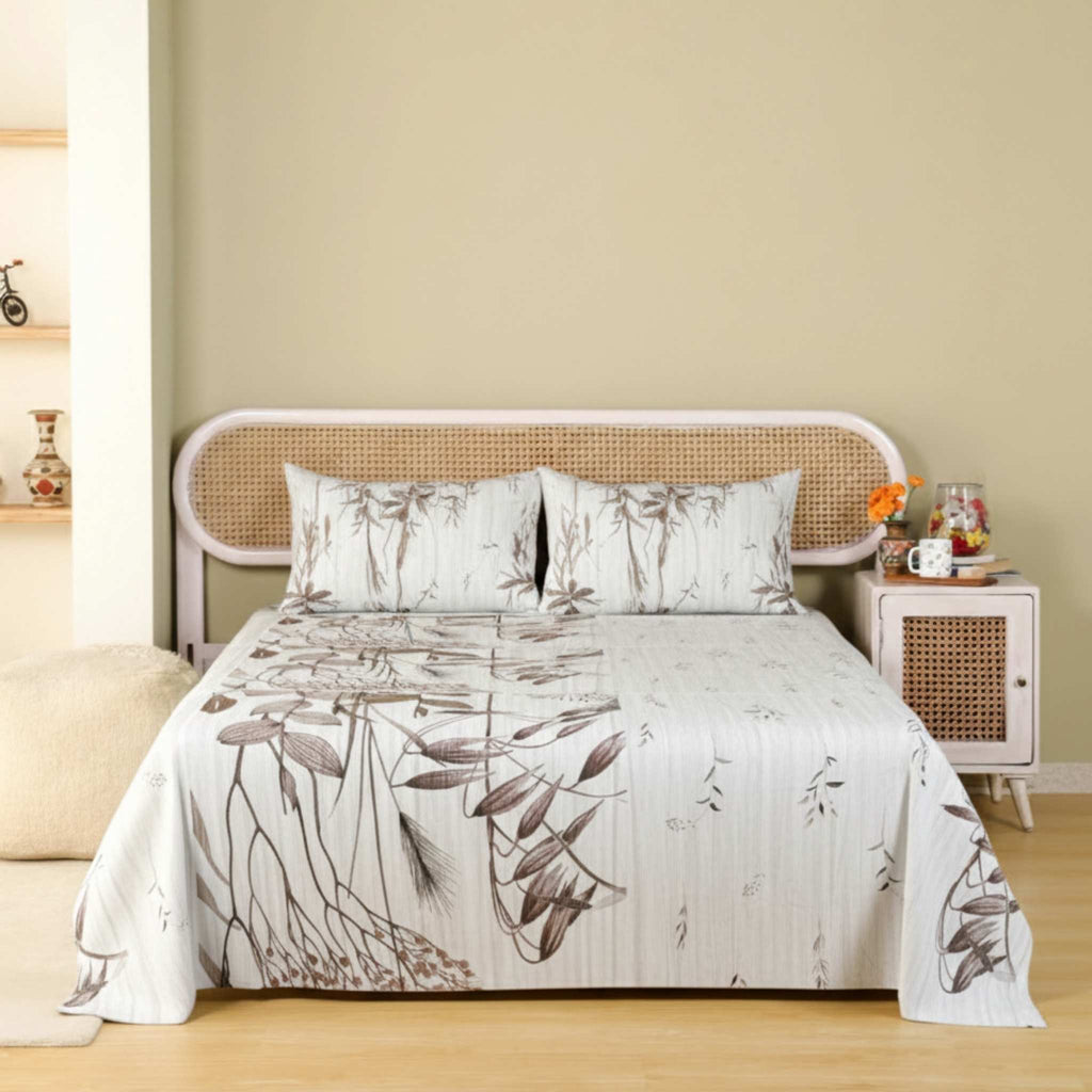 Bed with floral bedding in a bedroom setting